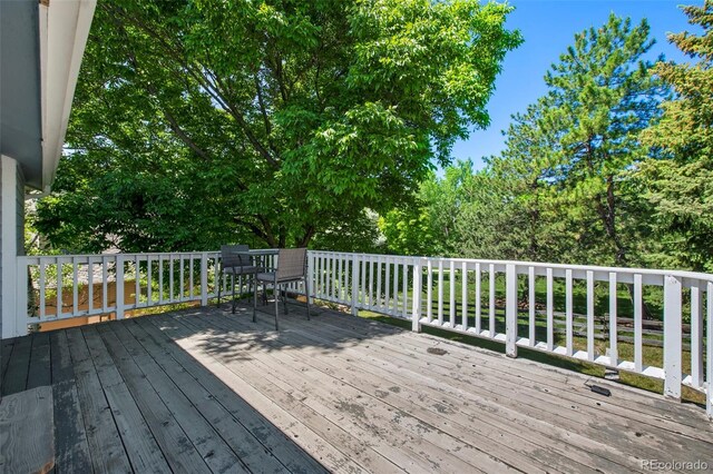 7773 Gunsight Pass, Littleton, CO 80127 - view of wooden deck