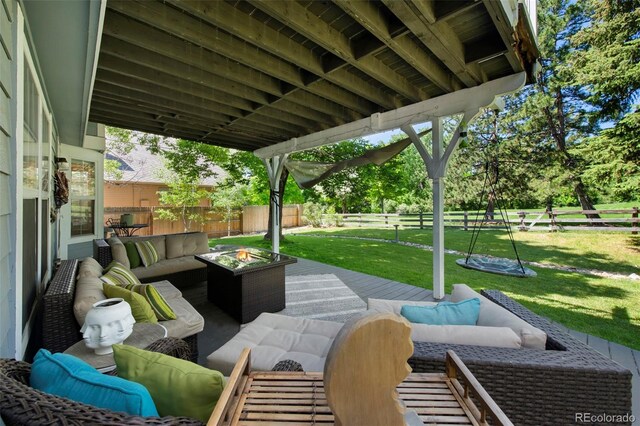 7773 Gunsight Pass, Littleton, CO 80127 - view of patio with an outdoor living space and a wooden deck