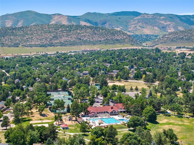 7773 Gunsight Pass, Littleton, CO 80127 - bird's eye view of a mountainous background and a pool area