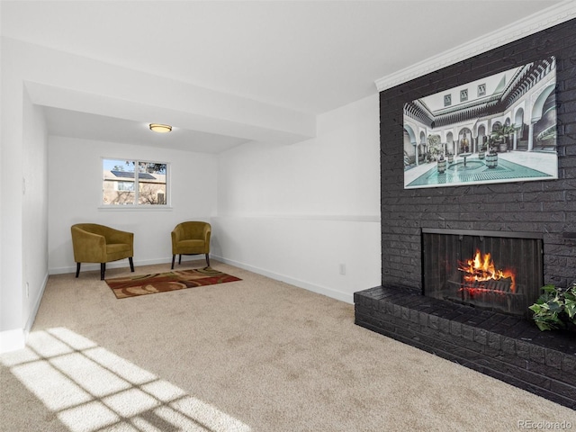 living area featuring carpet flooring, a fireplace, and baseboards