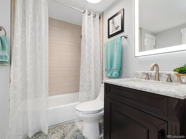 full bathroom featuring toilet, shower / bath combo, and vanity