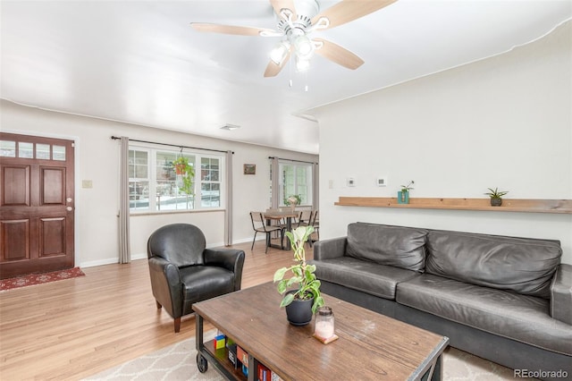 3865 Independence Ct, Wheat Ridge, CO 80033 - living room featuring light wood-style floors, baseboards, and a ceiling fan