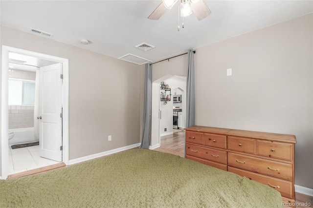 3865 Independence Ct, Wheat Ridge, CO 80033 - bedroom with baseboards, ceiling fan, light colored carpet, and visible vents