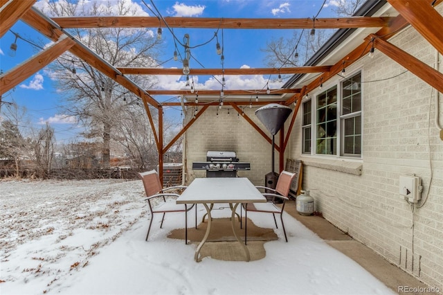 3865 Independence Ct, Wheat Ridge, CO 80033 - snow covered patio with outdoor dining space