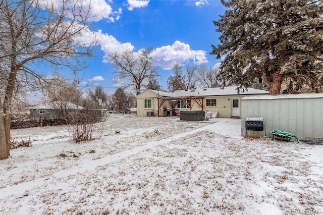 3865 Independence Ct, Wheat Ridge, CO 80033 - snow covered property with a hot tub