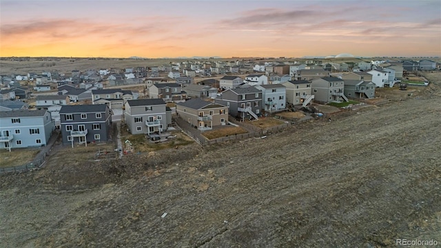 aerial view at dusk with a residential view