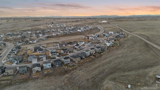 birds eye view of property featuring a residential view and a mountain view