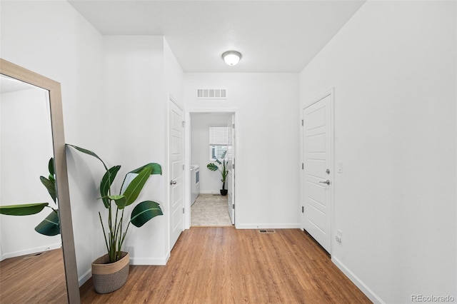 hall featuring light wood-type flooring