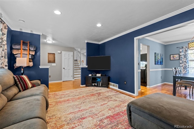 3767 E Phillips Cir, Centennial, CO 80122 - living area with stairs, baseboards, light wood-type flooring, recessed lighting, and ornamental molding