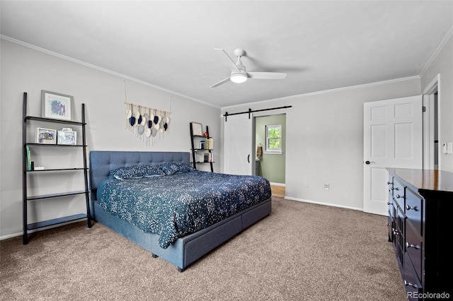 3767 E Phillips Cir, Centennial, CO 80122 - bedroom with crown molding, carpet flooring, baseboards, a barn door, and ceiling fan
