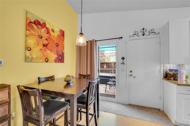 dining room with light wood-type flooring