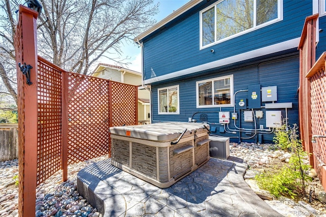 back of house with fence