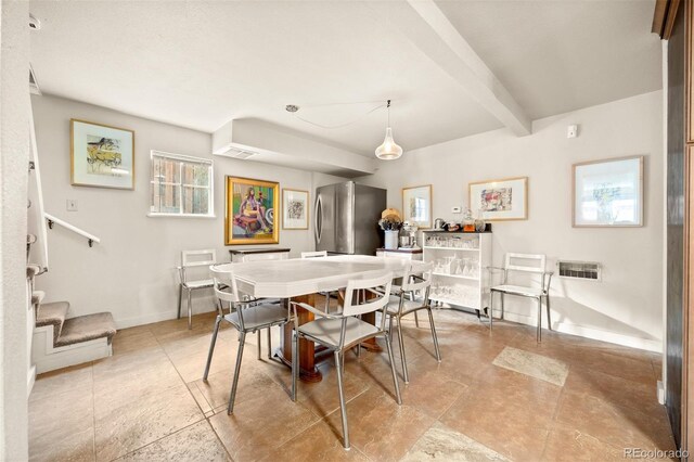 2041 Virginia St, Idaho Springs, CO 80452 - dining room with baseboards, beamed ceiling, stairway, and visible vents