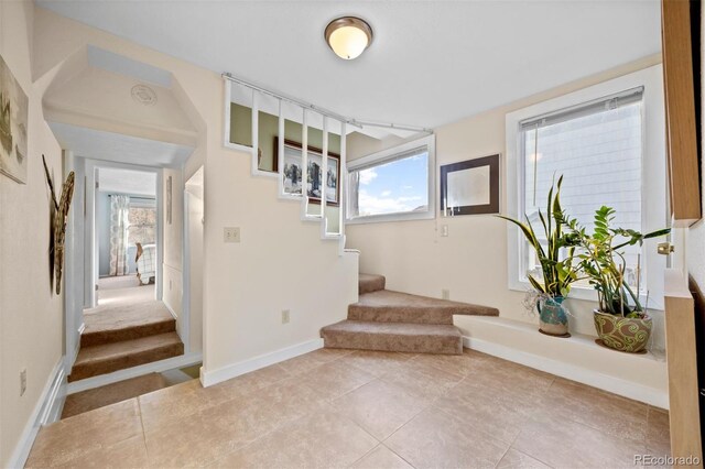 2041 Virginia St, Idaho Springs, CO 80452 - interior space with baseboards, tile patterned flooring, and a healthy amount of sunlight