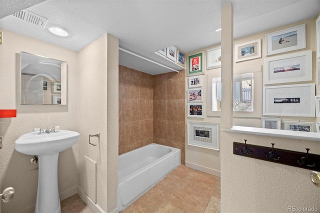 2041 Virginia St, Idaho Springs, CO 80452 - bathroom with a sink, tile patterned flooring, baseboards, and visible vents