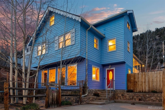2041 Virginia St, Idaho Springs, CO 80452 - view of front of home featuring fence and entry steps