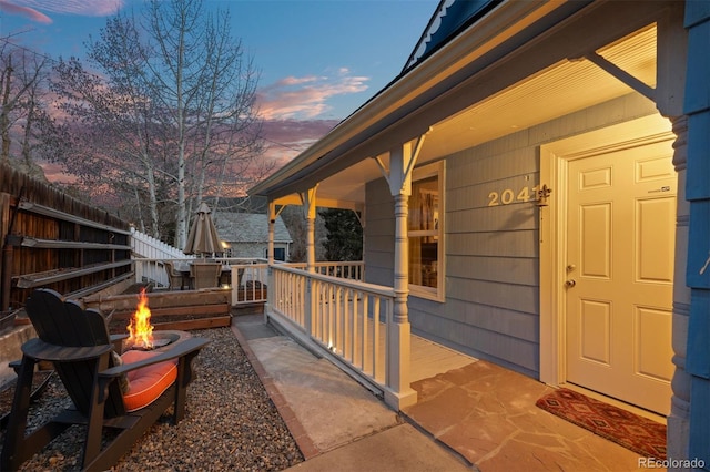 2041 Virginia St, Idaho Springs, CO 80452 - entrance to property with covered porch and fence