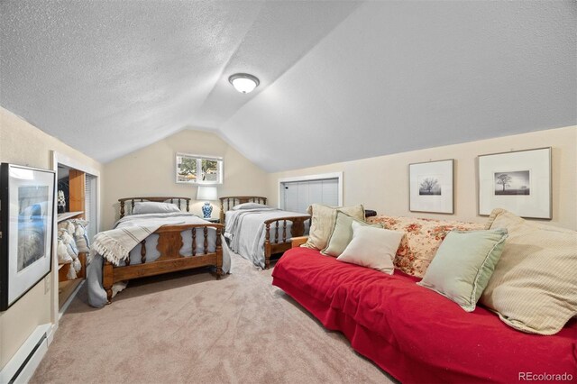 2041 Virginia St, Idaho Springs, CO 80452 - carpeted bedroom featuring a baseboard radiator, a textured ceiling, and vaulted ceiling
