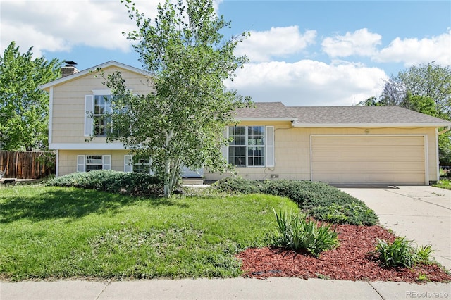 235 Summit Cir, Lafayette, CO 80026 - view of front of property featuring a garage, concrete driveway, a chimney, and a shingled roof