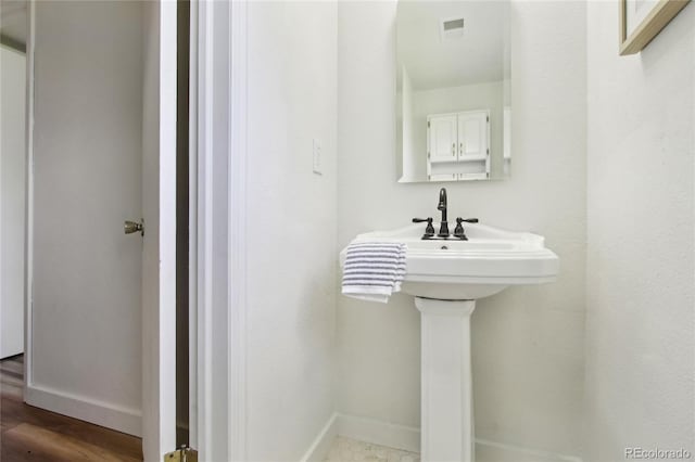 235 Summit Cir, Lafayette, CO 80026 - bathroom featuring baseboards