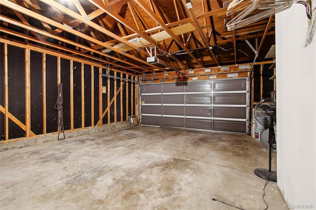 235 Summit Cir, Lafayette, CO 80026 - garage featuring a garage door opener