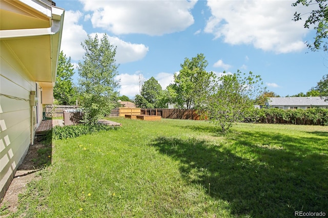 235 Summit Cir, Lafayette, CO 80026 - view of yard featuring a deck