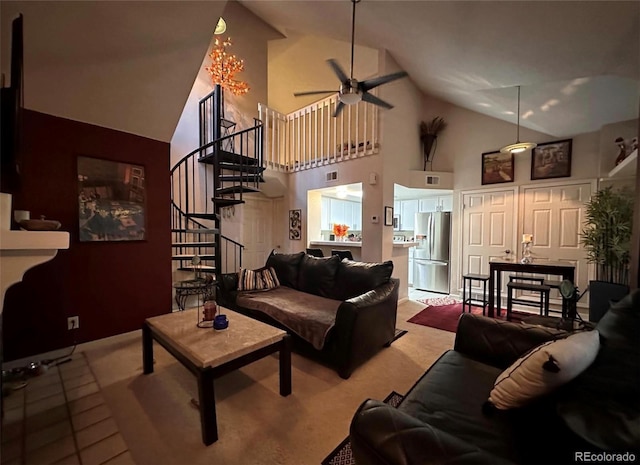 tiled living area featuring stairway, a ceiling fan, and high vaulted ceiling