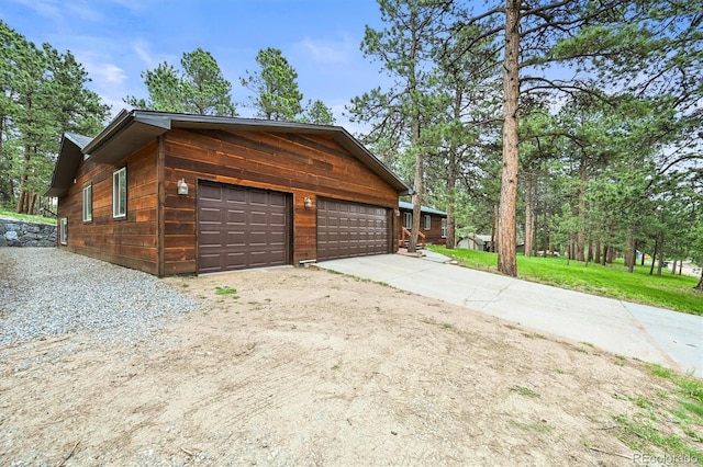 26499 W St, Conifer, CO 80433 - garage featuring driveway
