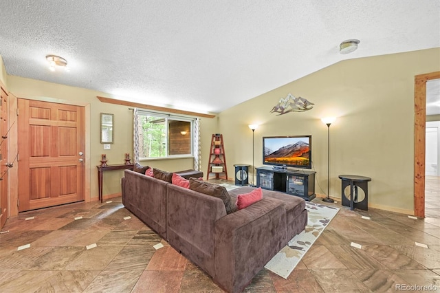 26499 W St, Conifer, CO 80433 - living area featuring vaulted ceiling and a textured ceiling