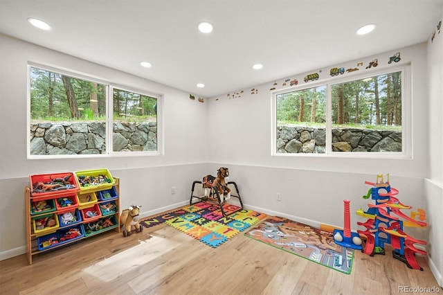 26499 W St, Conifer, CO 80433 - rec room with wood finished floors and recessed lighting