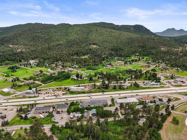 26499 W St, Conifer, CO 80433 - view of mountain backdrop featuring a heavily wooded area