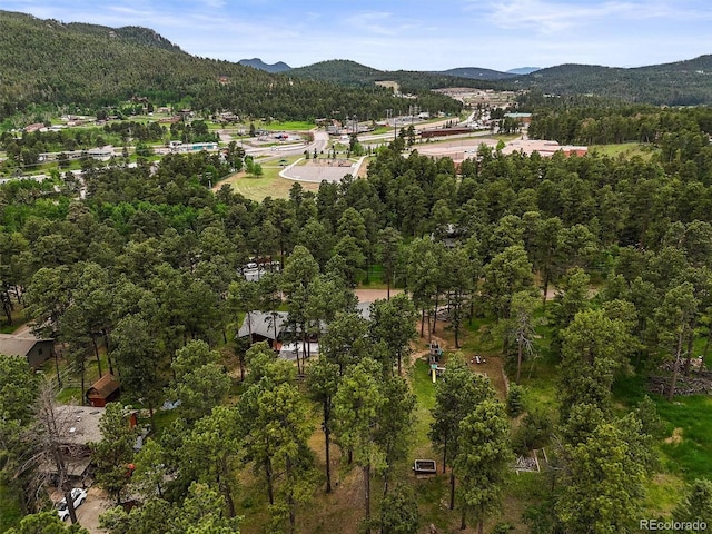 26499 W St, Conifer, CO 80433 - aerial view of property's location featuring a mountain backdrop