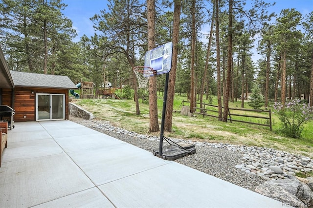 26499 W St, Conifer, CO 80433 - view of patio with a grill and view of scattered trees