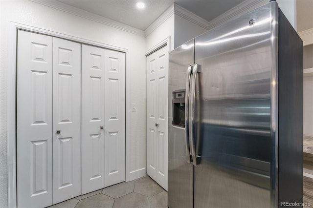 12118 W Dorado Pl Unit 206, Littleton, CO 80127 - kitchen featuring stainless steel fridge with ice dispenser, crown molding, and light tile patterned flooring