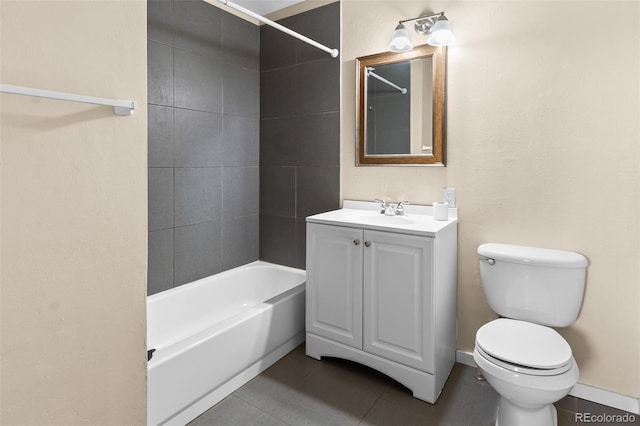 full bath with toilet, tile patterned floors, vanity, and shower / washtub combination