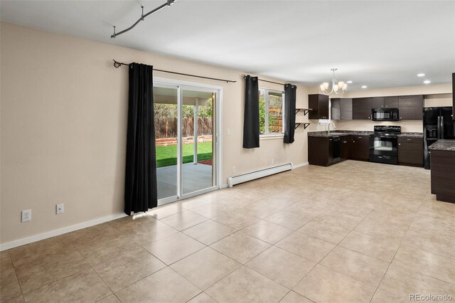 kitchen with baseboard heating, black appliances, a chandelier, light tile patterned flooring, and recessed lighting