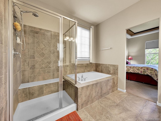 10565 Kicking Horse Dr, Littleton, CO 80125 - ensuite bathroom with a garden tub and a stall shower