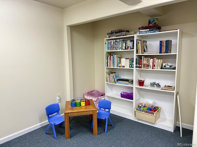 10565 Kicking Horse Dr, Littleton, CO 80125 - recreation room featuring carpet floors and baseboards