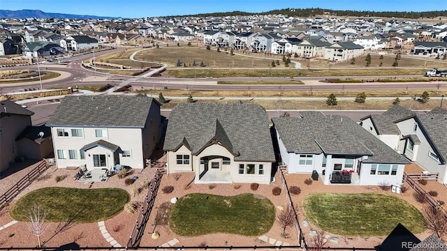 birds eye view of property with a mountain view