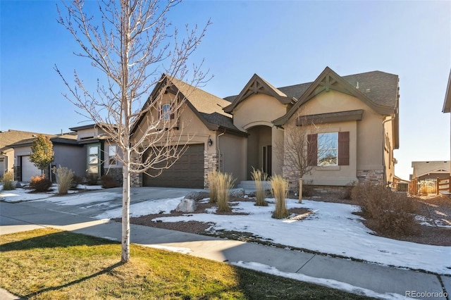 view of front of property with a garage