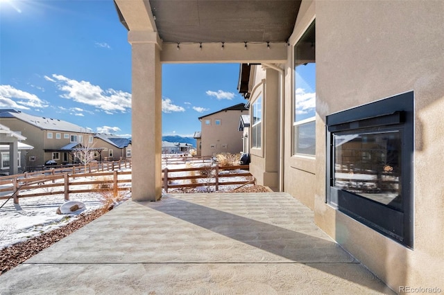 view of snow covered patio