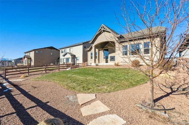 view of front of home with a front yard