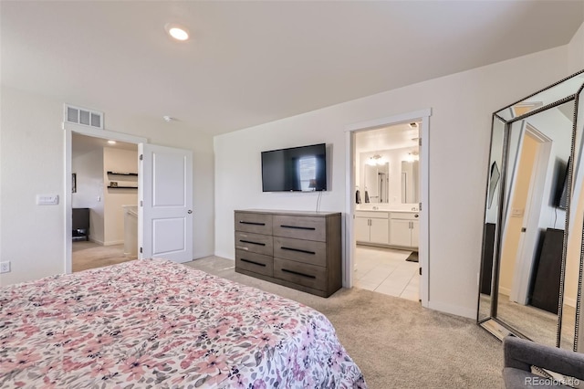 7702 E 159th Ave, Thornton, CO 80602 - bedroom with light colored carpet, ensuite bath, and recessed lighting