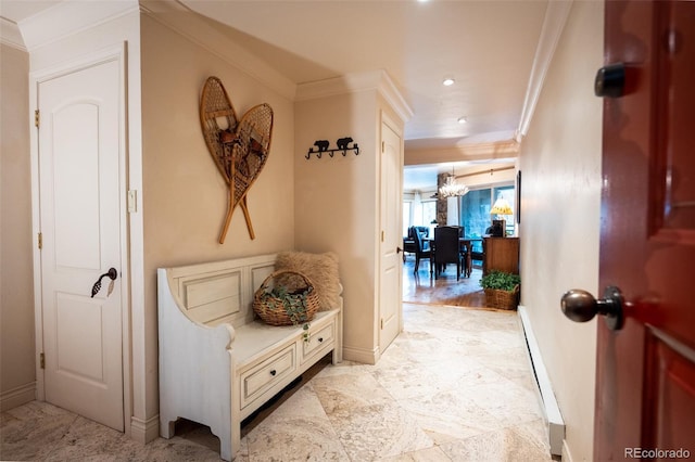 765 Columbine St Unit C203, Breckenridge, CO 80424 - hall featuring ornamental molding, baseboards, a chandelier, recessed lighting, and a baseboard heating unit