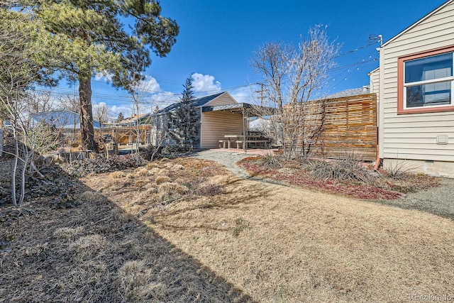 view of yard with a patio area and fence