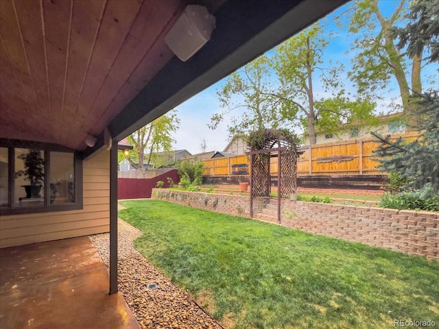 7217 S Zephyr Way, Littleton, CO 80128 - view of yard with a patio area