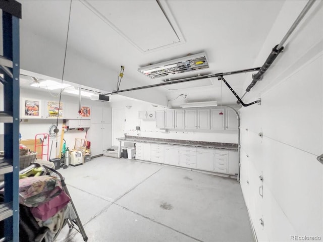 7217 S Zephyr Way, Littleton, CO 80128 - garage featuring a garage door opener