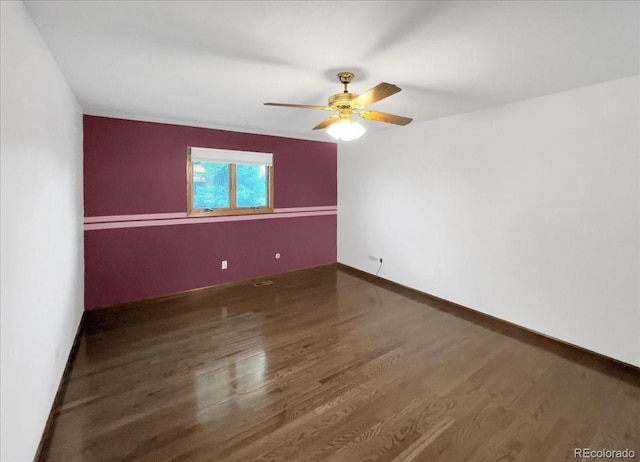 7217 S Zephyr Way, Littleton, CO 80128 - unfurnished room with a ceiling fan, wood finished floors, and baseboards