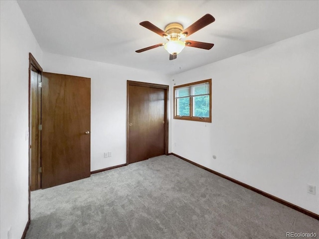 7217 S Zephyr Way, Littleton, CO 80128 - unfurnished bedroom with carpet floors, a closet, baseboards, and ceiling fan