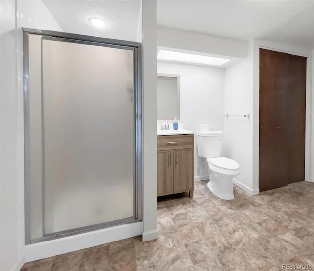 7217 S Zephyr Way, Littleton, CO 80128 - bathroom with a stall shower, vanity, and toilet